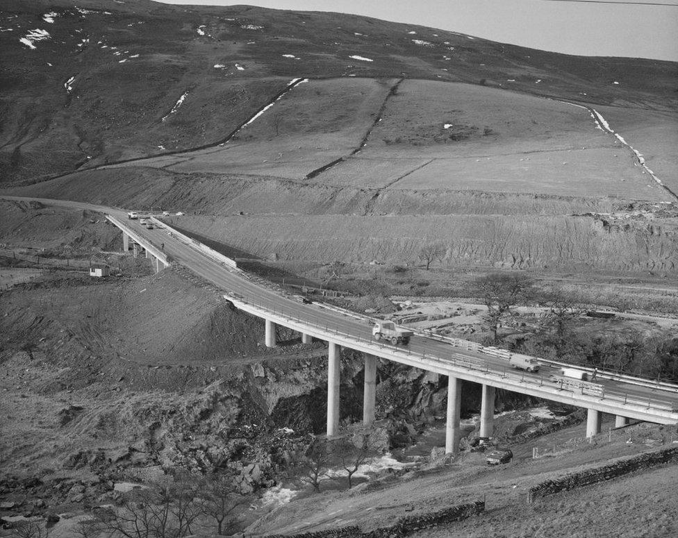 A view of the construction of the M6 Motorway through the Lune Gorge, showing the Roger Howe bridge carrying the A685 over the River Lune on 27 February, 1970