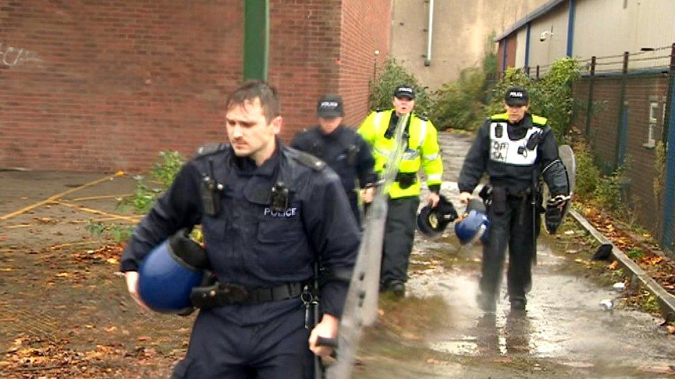 Police leaving the site of the illegal rave near Bristol