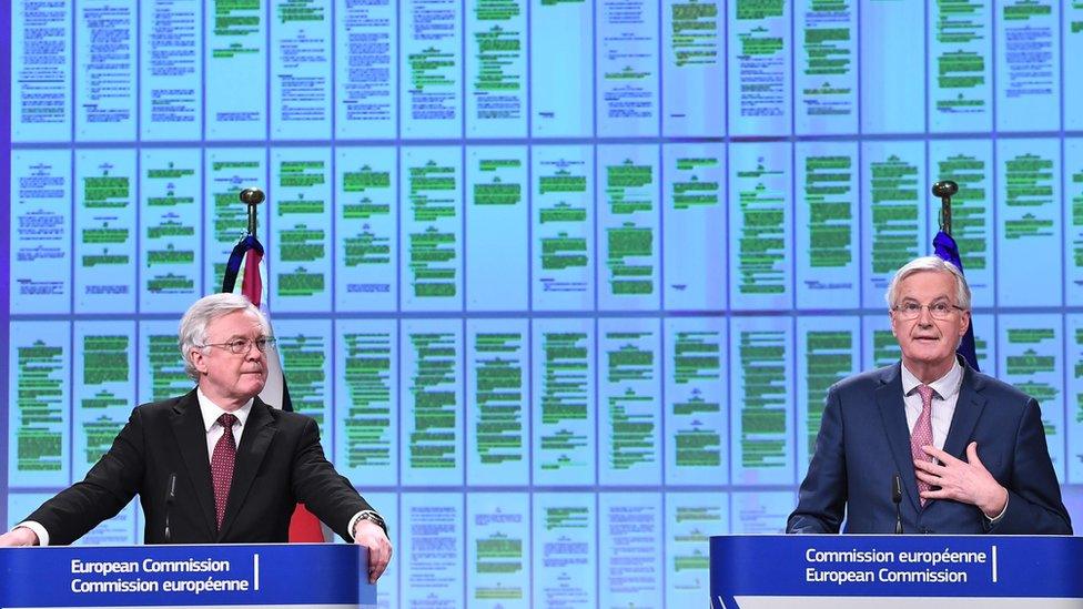 UK Brexit minister David Davis (L) and EU chief negotiator Michel Barnier in Brussels on 19 March 2018