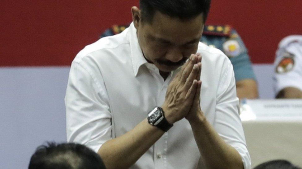 Lion Air founder Rusdi Kirana bows his head