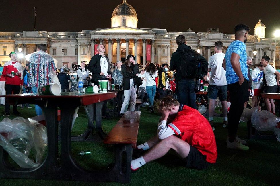 England fans are dejected after England lose the game on penalties at the Trafalgar Square Fan Zone in London as they watch the UEFA Euro 2020 Final between Italy and England. July 11, 2021.