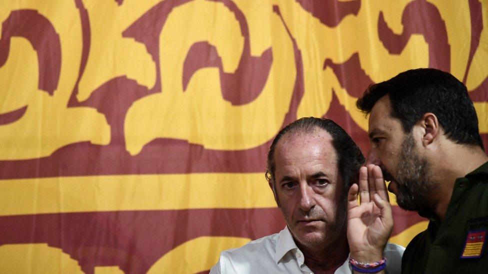 Matteo Salvini (R) chats with President of Veneto Region Luca Zaia during a party rally on August 30, 2019