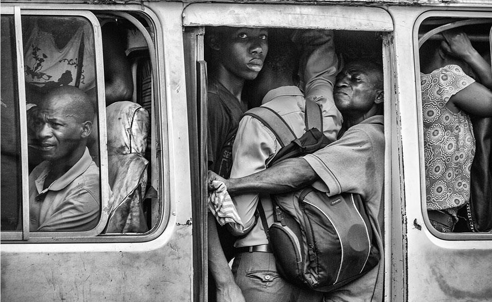 People crammed into a bus