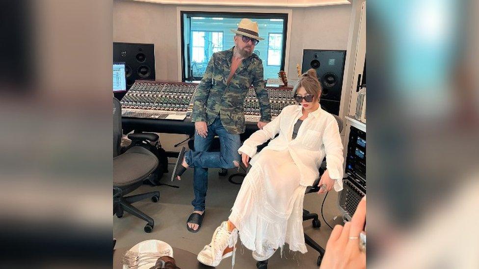 Dave Stewart and Faye Fantarrow in a music studio