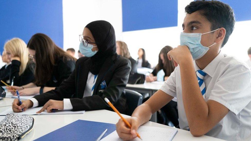 Children wearing masks in schools