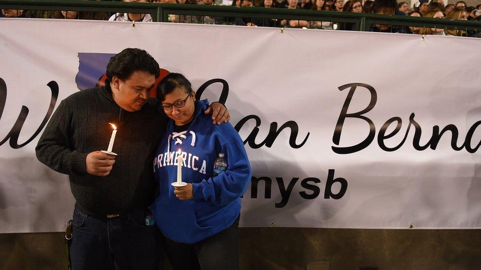 Mourners at a vigil in San Bernardino