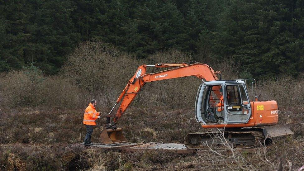 Digger in Bragan Bog searching for Columba McVeigh April 2023