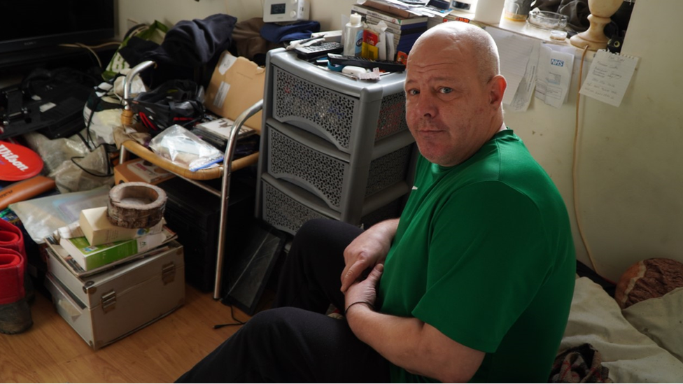 Leon Rose in his flat in Kendal Court