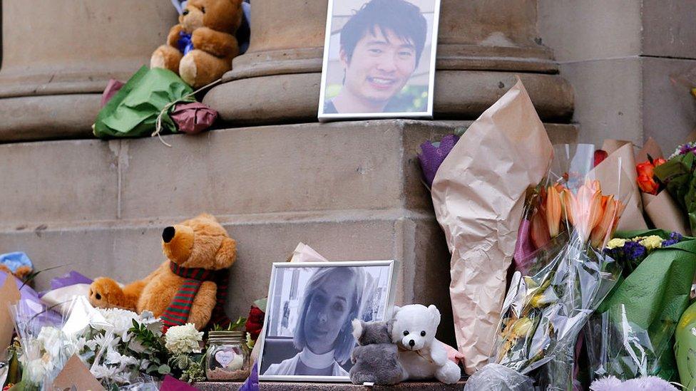 A makeshift memorial in 2017 featuring flowers, a soft toy, and photos of victims Matthew Si and Jess Mudie