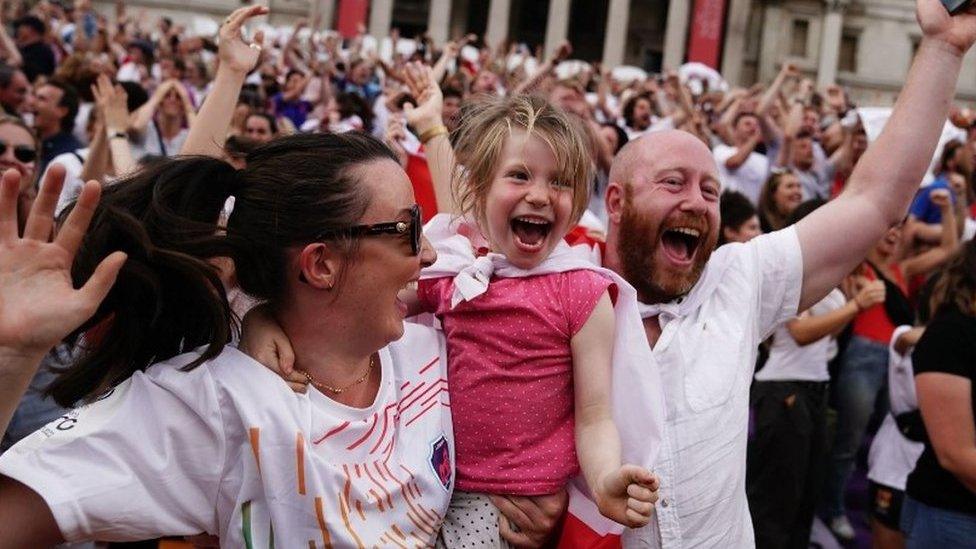 Fans celebrate England's historic win