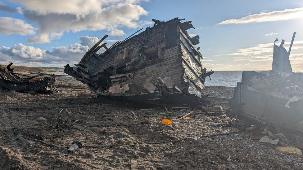 The shipwreck and the rubble on the beack