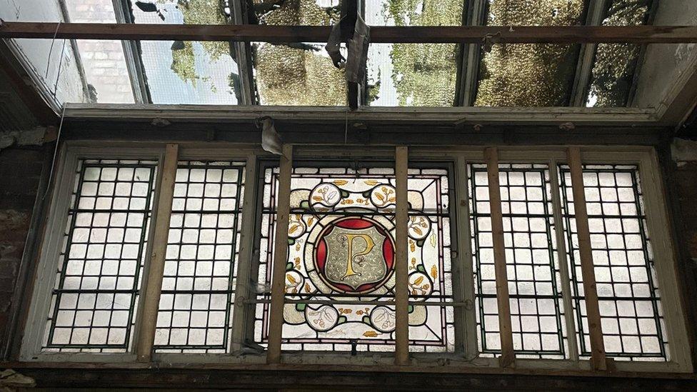 A stained glass window in the old Palmers building