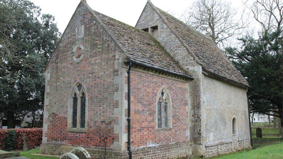 St Mary's exterior with the church surrounded by trees