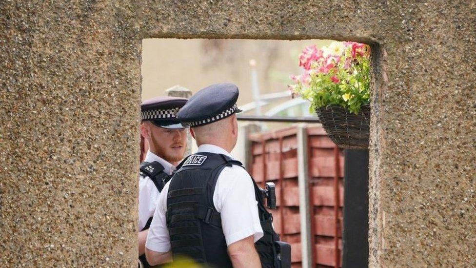 Police outside flat in Staines Road, Bedfont