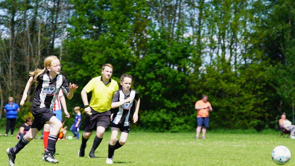 Emmy chases the ball during a game in Perth