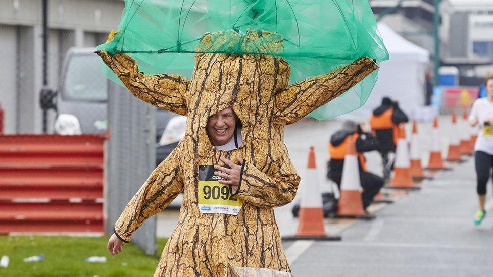 Runner dressed as a tree