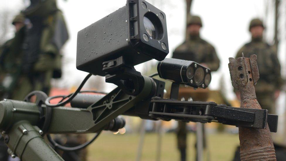 A reconnaissance robot being demonstrated in Poland