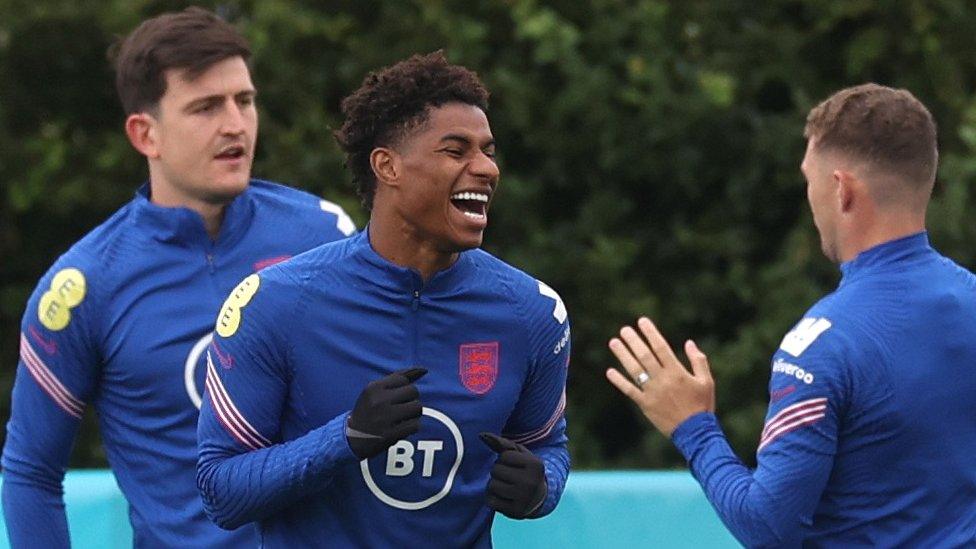 Harry Maguire, Marcus Rashford and Kieran Trippier in training