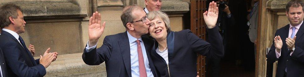 Theresa May with her husband Philip outside Parliament on 11 July