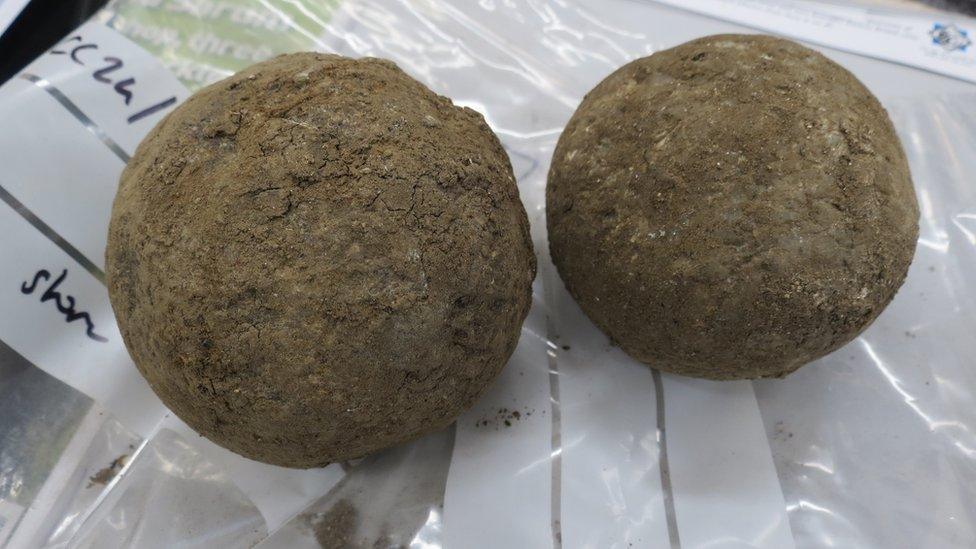 Close up of two stone cannon balls