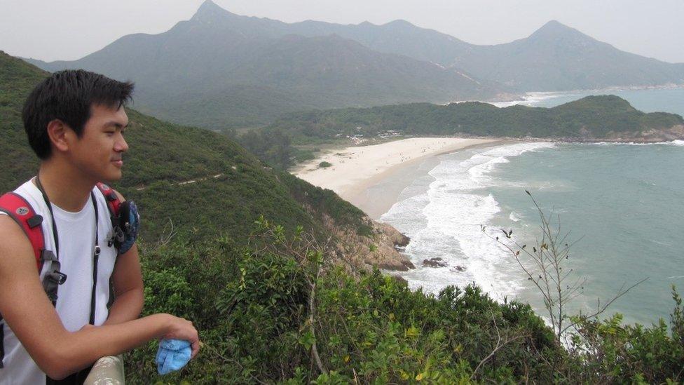 Yau looks out at landscape