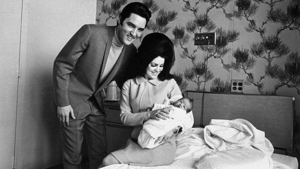 Elvis and Priscilla Presley with their daughter Lisa-Marie in February 1968