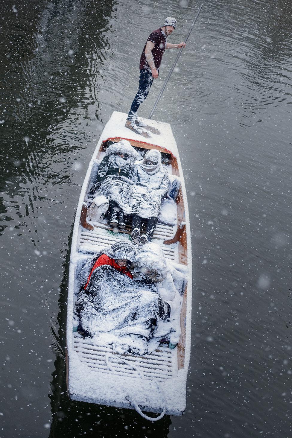 Punters in snow