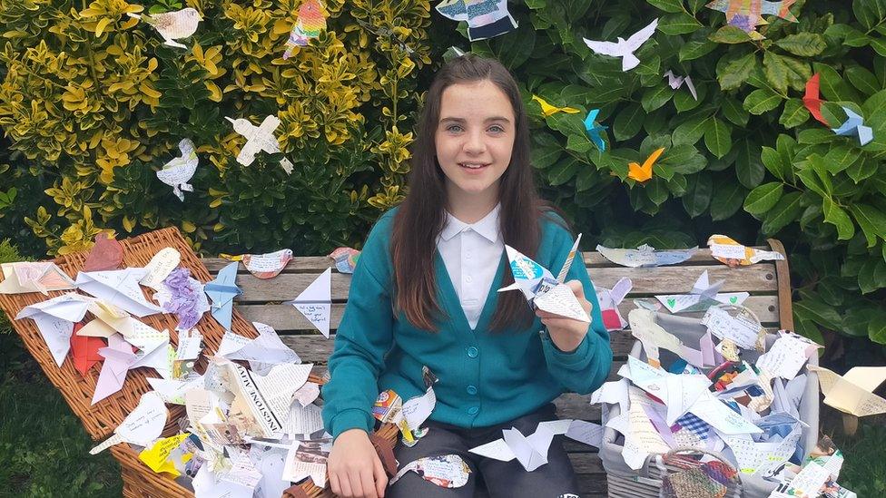 Annabelle with paper birds.