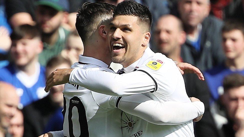 Joel Piroe celebrates with Liam Cullen