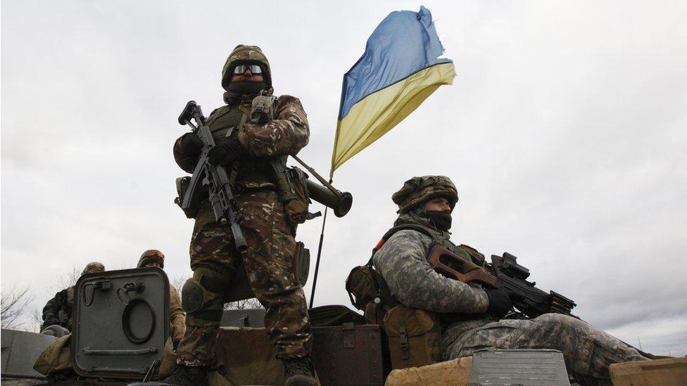 Ukrainian military personnel on an armoured personnel carrier, near Donetsk, December 2014