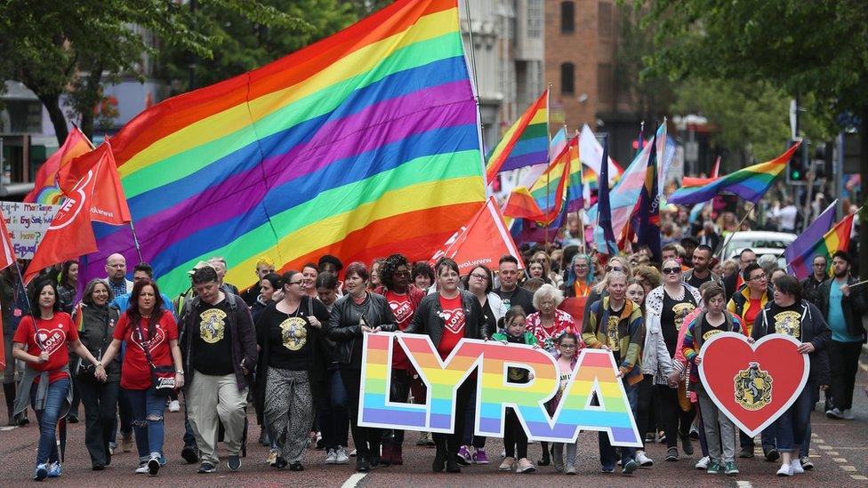 Sara Canning (front centre), partner of murdered journalist Lyra McKee, marching with protesters through Belfast city centre demanding same sex marriage in Northern Ireland.