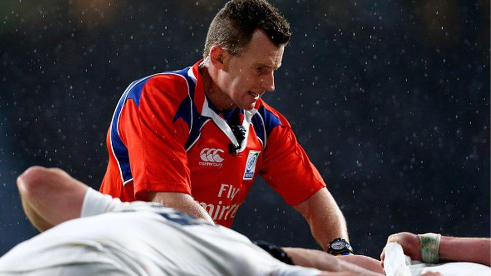 Nigel Owens overseeing a scrum