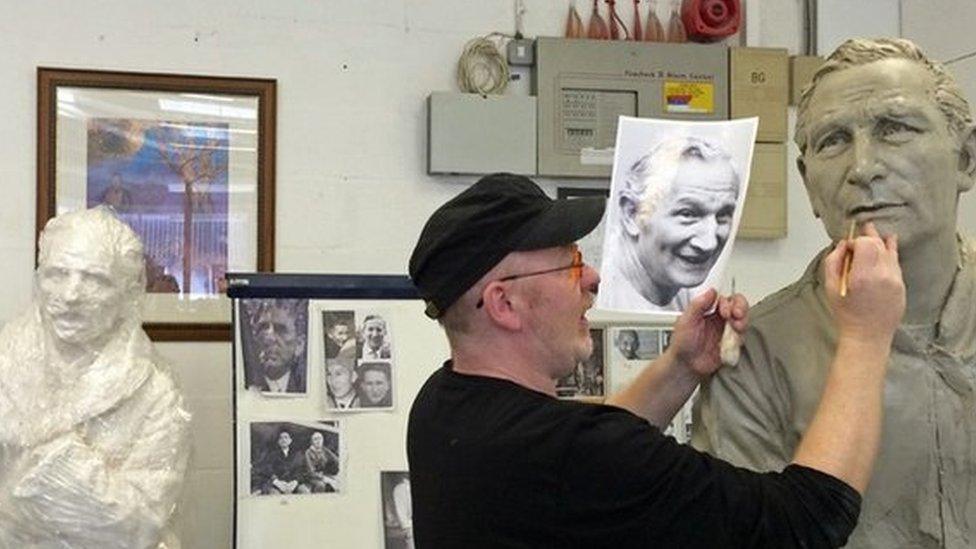 Andrew Edwards works on Jack Wheeler's face