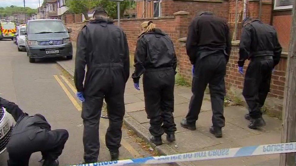 Police carrying out finger-tip search