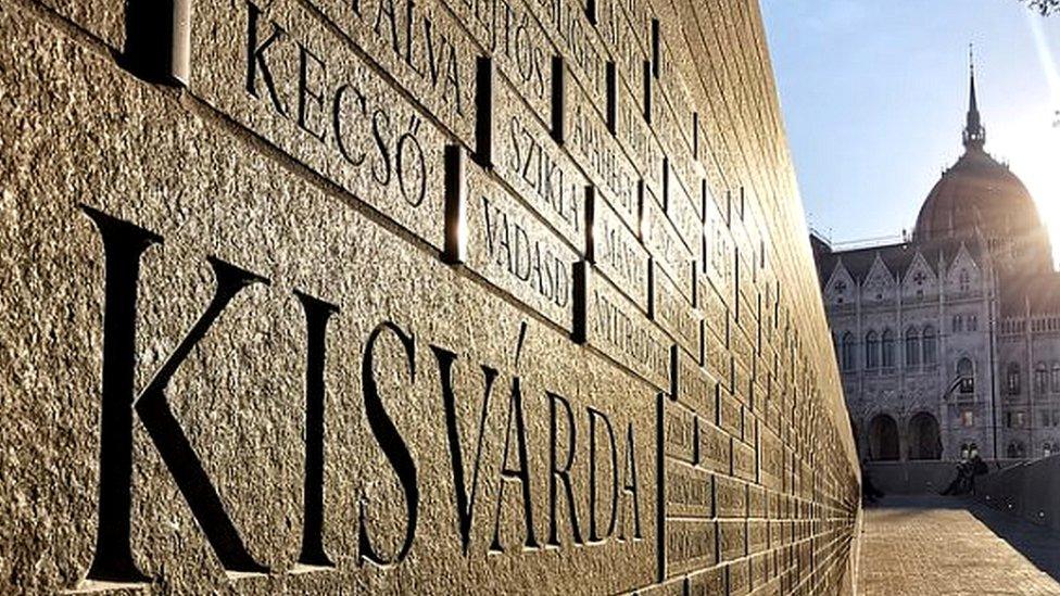 Place names from historic Hungary are listed on the monument in stainless steel