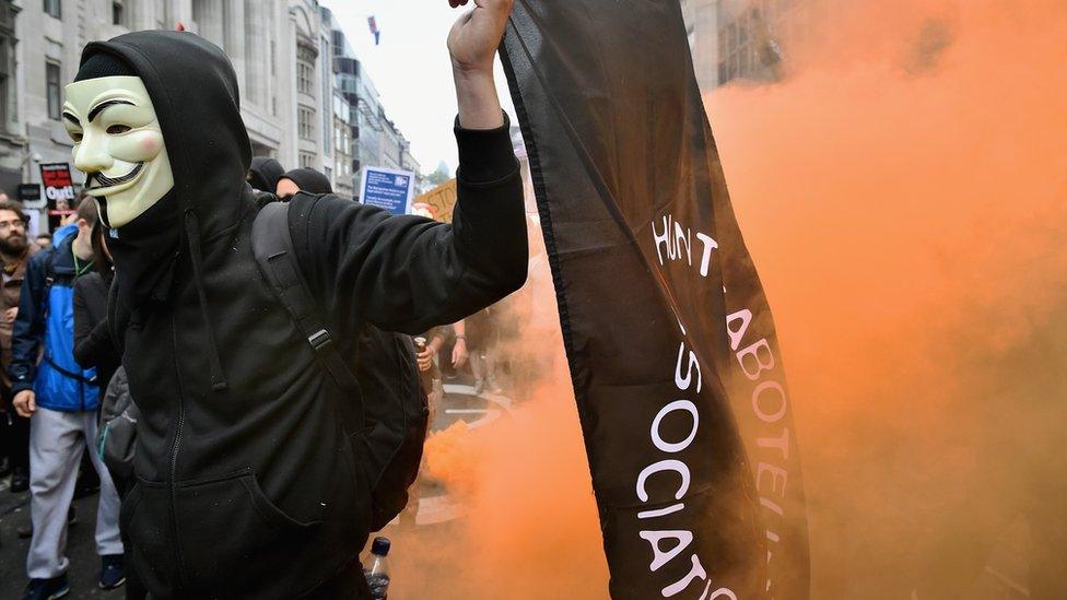 An anti-austerity protester in London, June 2015