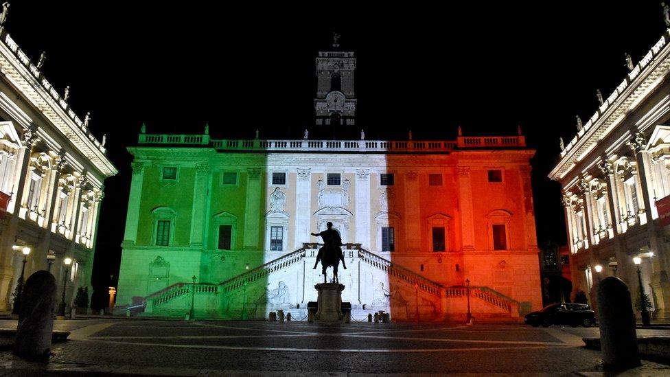 Rome's Municipal building is illuminated with the colours of the Italian national flag to show the fight against the new type of coronavirus (COVID-19) pandemic to curb at Campidoglio Square in Rome