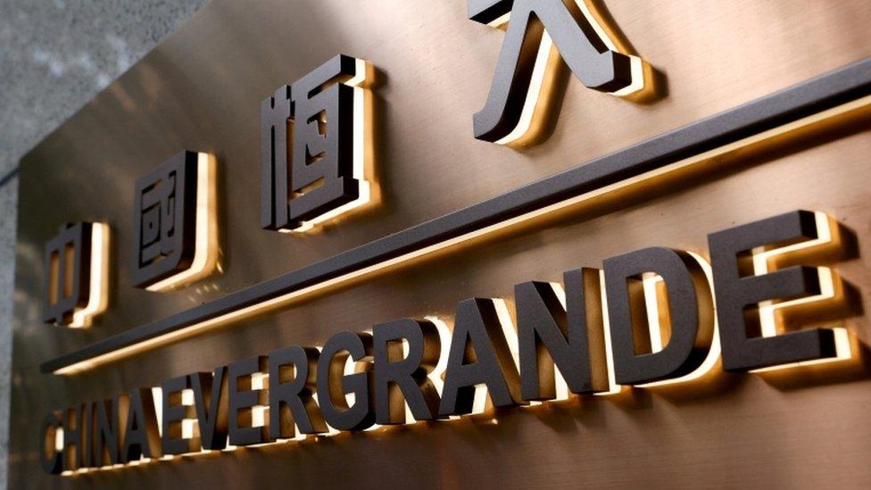 The China Evergrande Centre building sign is seen in Hong Kong.