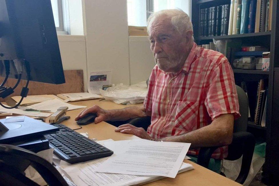 Dr Goodall working at his Edith Cowan University office