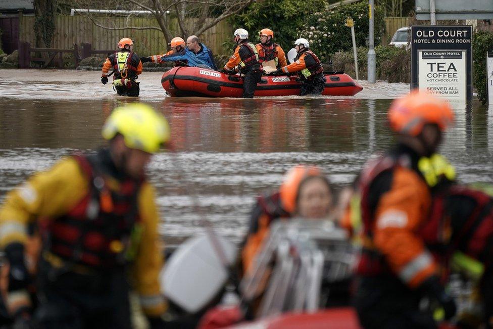 Firefighters rescue staff and residents from a care home in the village of Whitchurch.