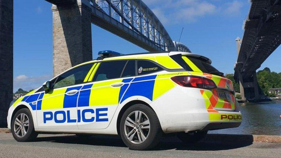 Police car beneath the Tamar Bridge