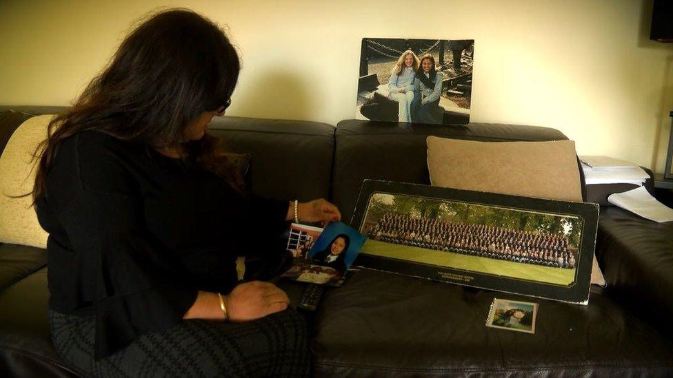 Daksha Dalal looking at photos of her daughter