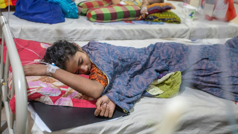 Twelve-years old Shahana receives treatment for dengue fever at Mugda Medical College and Hospital in Dhaka, Bangladesh, 15 August 2023. According to the Directorate General of Health Services (DGHS), in the last 24 hours, 2,480 dengue patients, including 919 in the capital, are receiving treatment at hospitals across the country. So far, 87,891 dengue cases have been recorded this year, with 78,044 recoveries and 416 deaths.