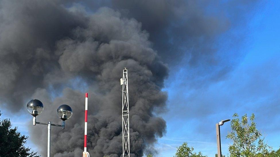 Plums of smoke from fire at Milton Keynes Waitrose distribution centre