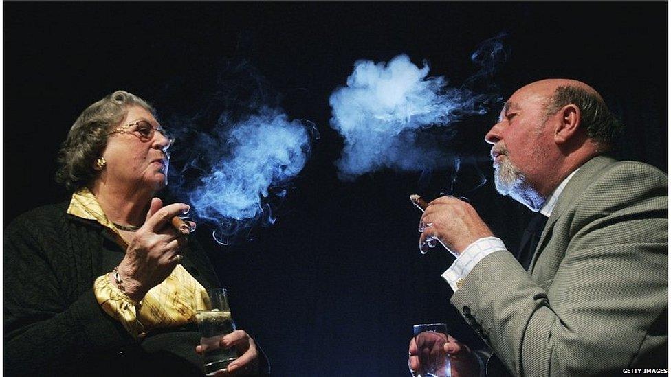 Baroness Trumpington and Lord Pendry smoking cigars in 2006