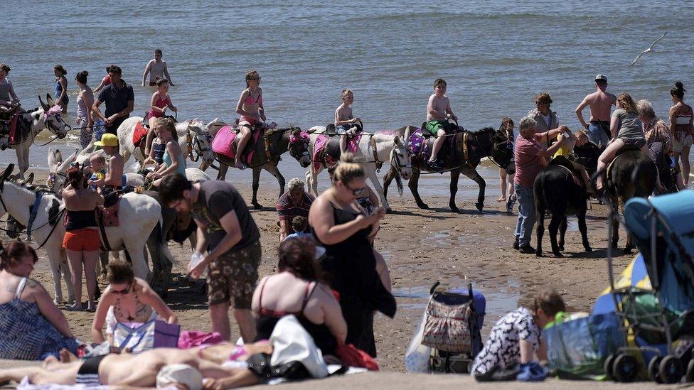 Children riding donkeys in Blackpool