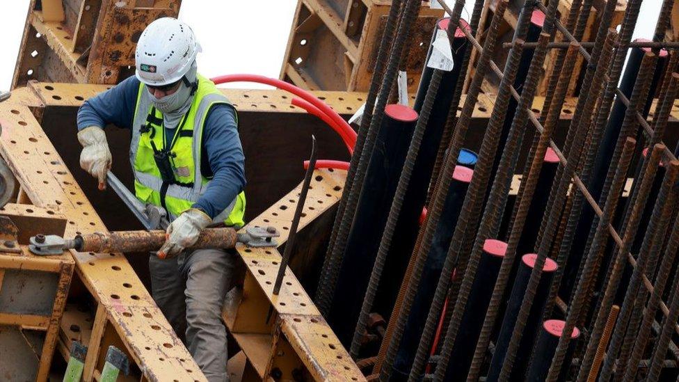 A construction worker helps build the “Signature Bridge" on January 05, 2024 in Miami, Florida.