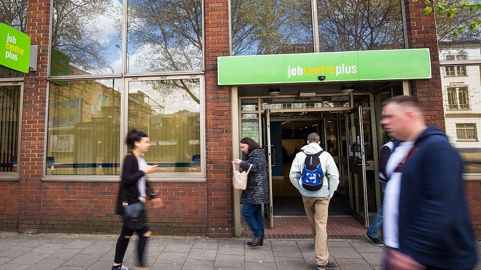 People walking near a Job Centre in Westminster