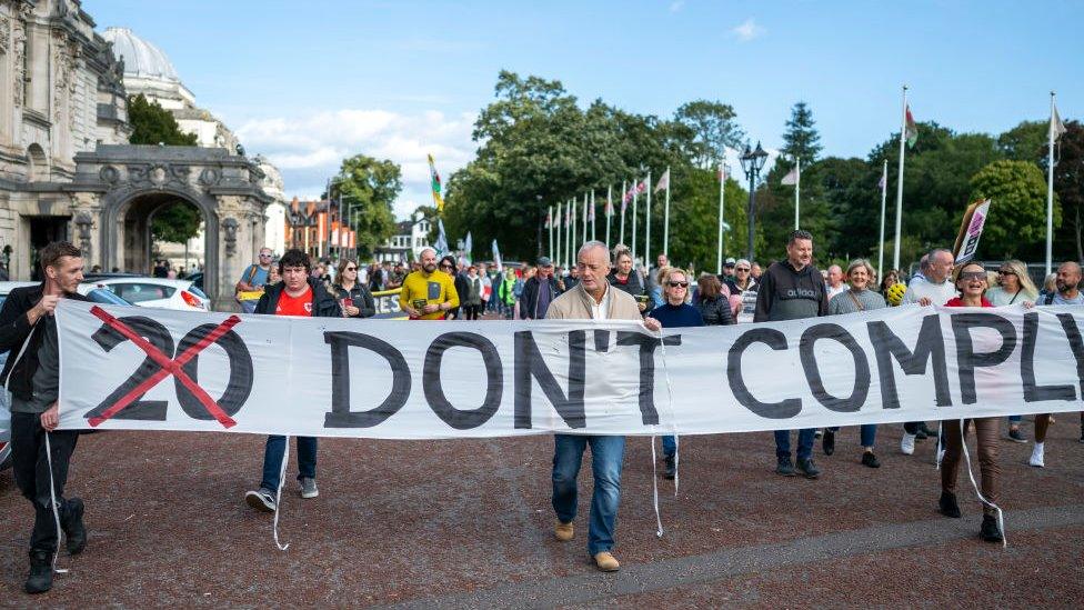 People protest against the 20mph law change in Cardiff