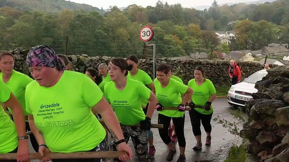 The women pulling the car up Kirkstone Pass